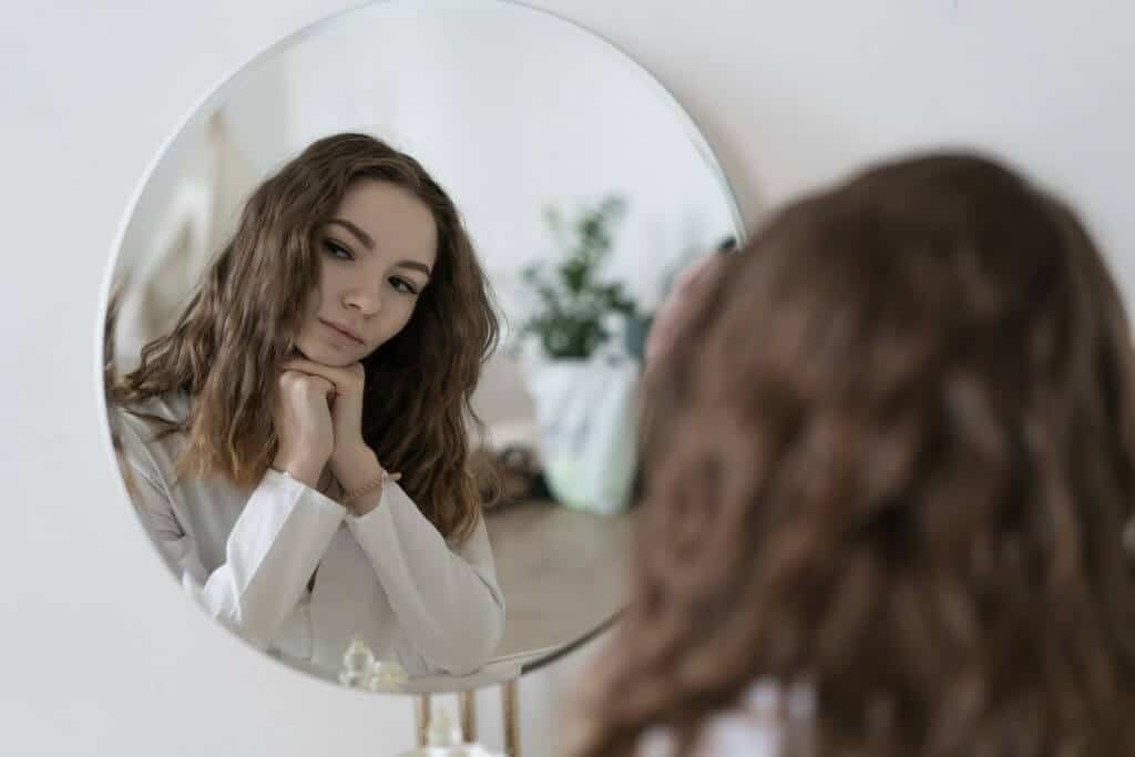 Woman self reflecting to help live a meaningful life