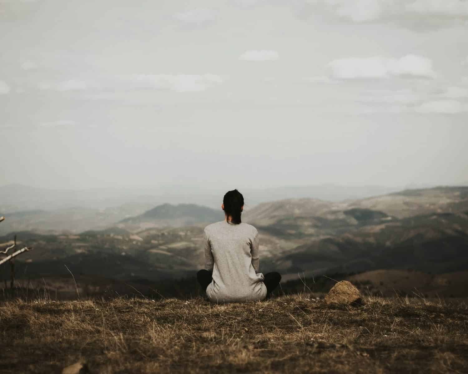 Woman contemplating how to start living a meaningful life
