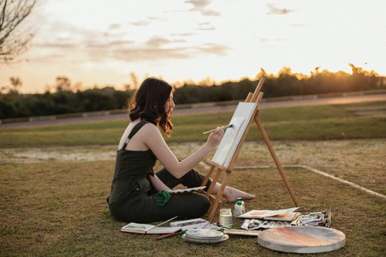 woman participating in hobby of painting
