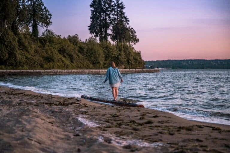 woman balancing on log representing balance in life