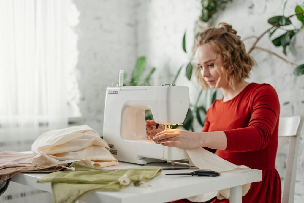 woman sewing at home, reflecting the hands-on and fulfilling benefits of having a hobby