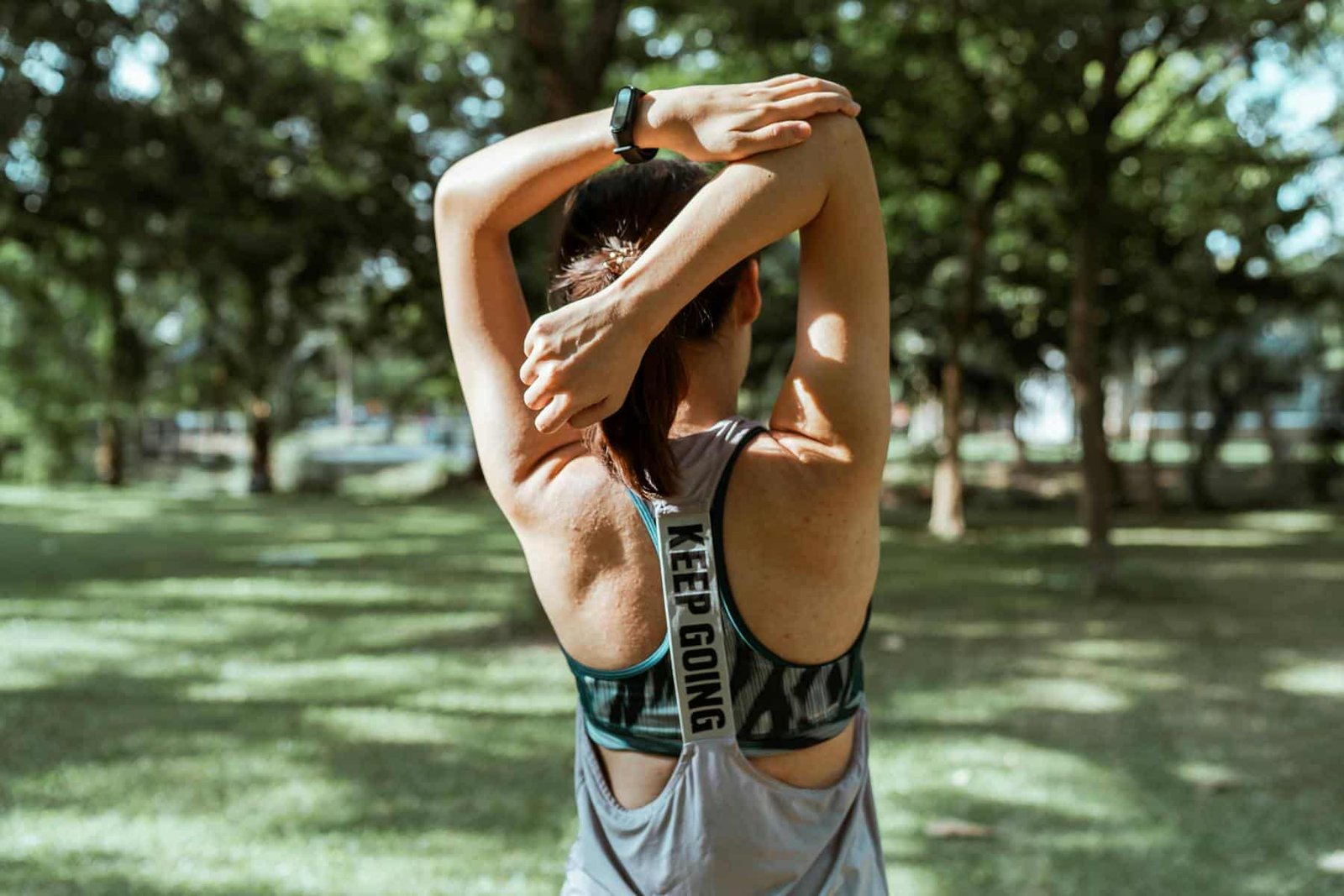 Woman stretching outside to enjoy active hobbies