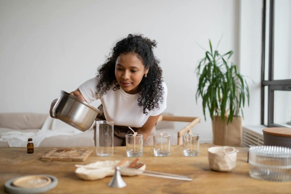 Photo of a woman making candles - one example of creative hobbies for women